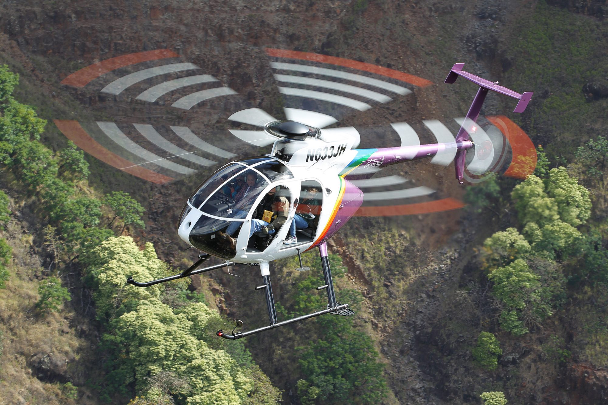 a helicopter flying in the air