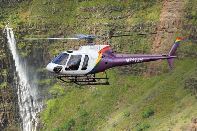 a small plane sitting on top of a mountain