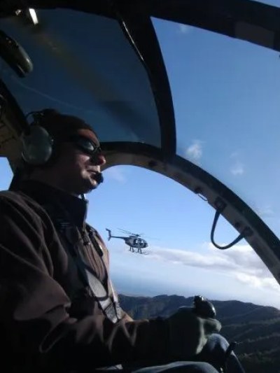 helicopter pilot in helicopter flying