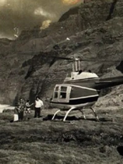 black and white historical helicopter photo of Na Pali Coast