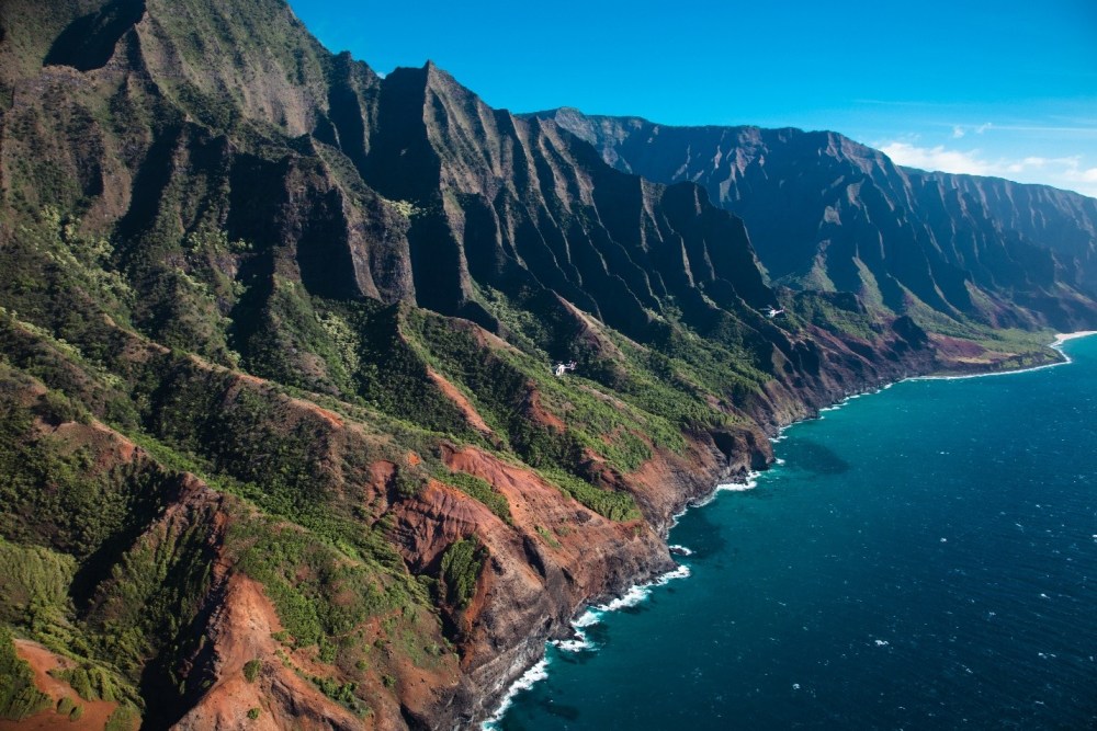 a canyon with Nā Pali Coast State Park in the background